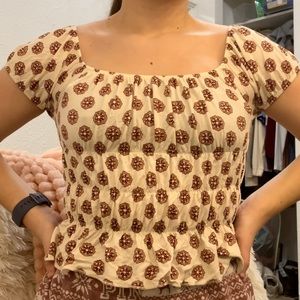 beige/maroon pattern crop top